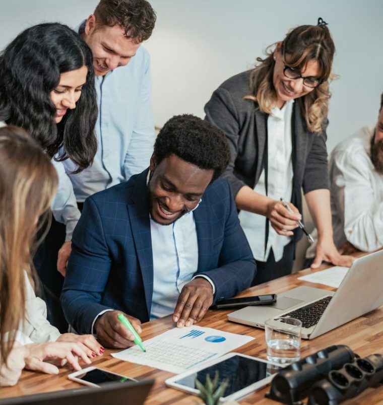 business-team-of-diverse-people-doing-strategic-planning-work-inside-modern-office.jpg